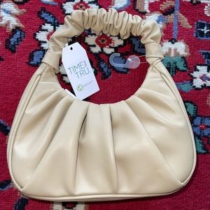 Brand new scrunch handle vegan leather bag